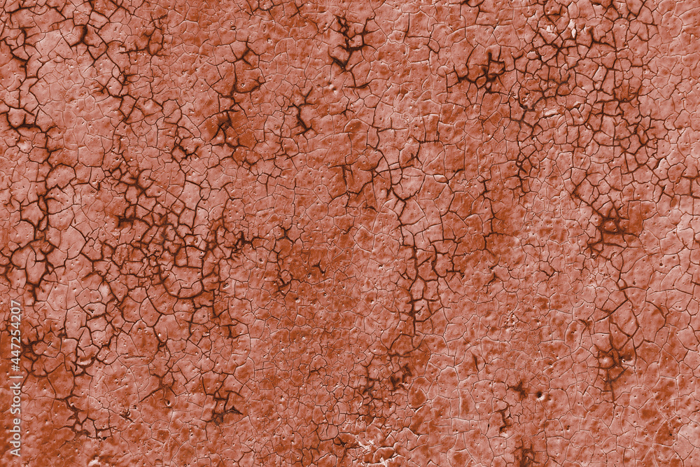 Texture of rough painted terracotta wall cracked from time Texture of rough painted terracotta wall cracked from time