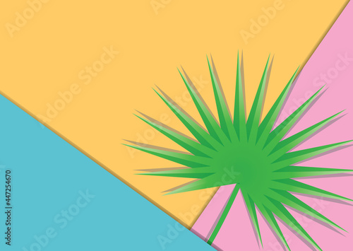 Pink, blue and yellow paper background with tropical leaf. Flat lay banner with empty space for your design