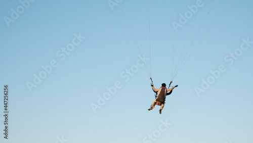 Billede på lærred Paragliders against the blue sky