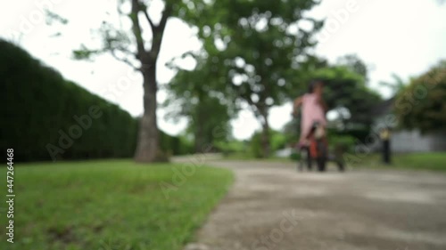 Wallpaper Mural Blur small girl with her mother at walkway. Torontodigital.ca