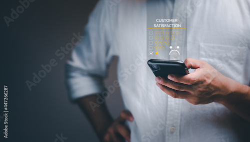 Foto Customer Experience dissatisfied Concept, Unhappy Businessman Client with Sadness Emotion Face on smartphone screen, Bad review, bad service dislike bad quality, low rating, social media not good