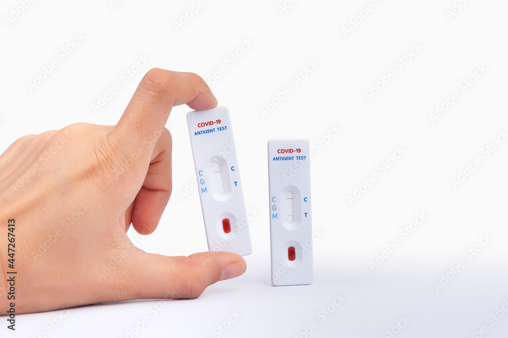 Hand holding Quick antibody detection test Coronavirus detection one