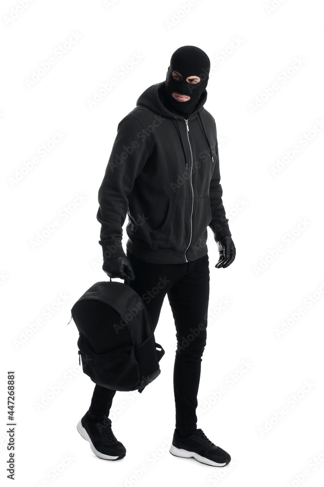 Man wearing black balaclava with backpack on white background Man wearing black balaclava with backpack on white background