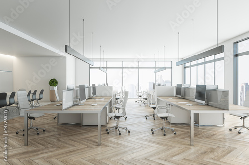 Fototapeta Naklejka Na Ścianę i Meble -  Side view on modern light eco style open space office with minimalistic work places, wooden floor and tabletops and city view from big windows