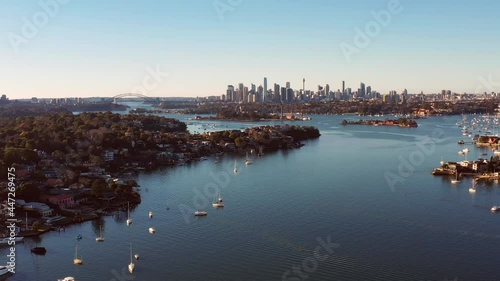 Gladesville bridge car traffic over Parramatta river in Sydney – aerial 4k.
 photo