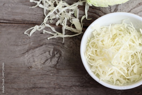 Chopped sliced fresh cabbage Chinese vegetable on wood table background