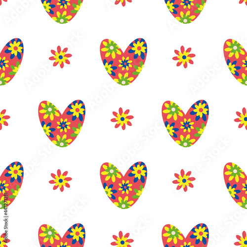 Seamless colorful love heart vector pattern in boho style. Bright floral hearts and flowers on white backdrop. Simple folk art botanical geometric repeat. For cottage decor, giftwrap, packaging