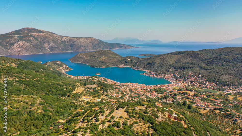 Fototapeta premium Aerial view of the capital town and the port of Vathy in Ithaca seen from the east side of the island