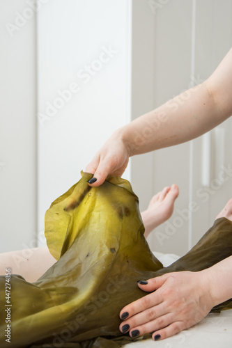 Spa treatment with seaweed wrap