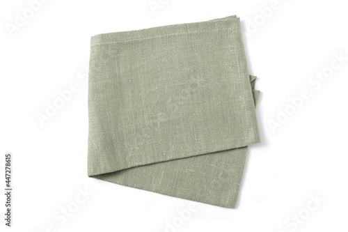 Green textile napkin isolated on white background. photo