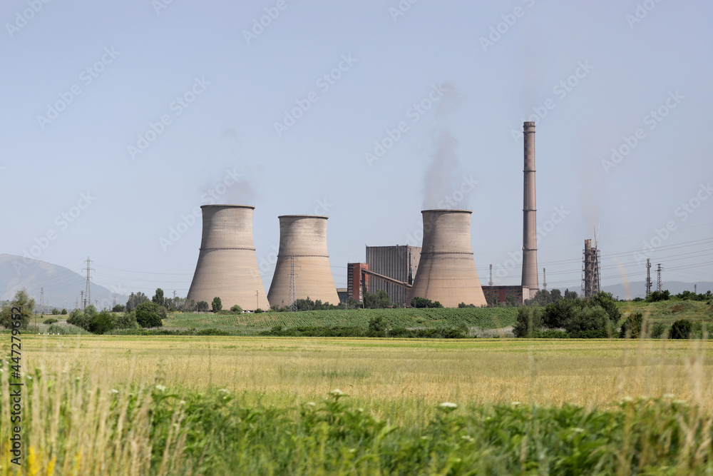 Thermal power plant (TPP) Bobov dol with illegal burning of waste on june, 2021. TEC or TETs Bobov dol with high air pollution on a blue sky. RDF Thermal power plant (TPP) Bobov dol with illegal burning of waste on june, 2021. TEC or TETs Bobov dol with high air pollution on a blue sky. RDF