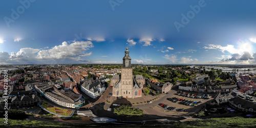 Aerial cityscape panorama of the Dutch medieval city of Zutphen in The Netherlands with the Walburgiskerk cathedral tower central in the frame. Ready for use in 3D environment mapping and 360VR. photo