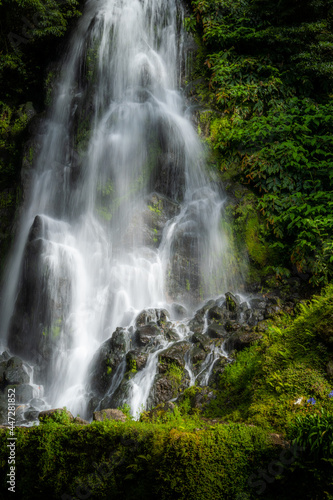 Beautiful waterfall at Parque Natural da Ribeira dos Caldeir  es on Sao Miguel  Azores