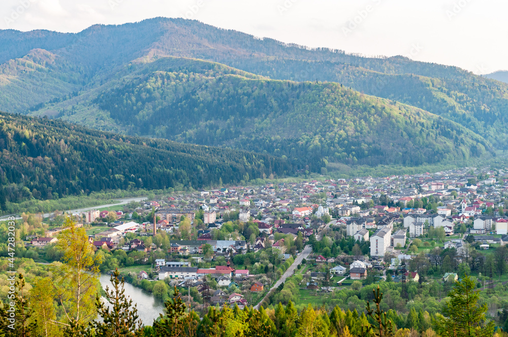 Skole town among Carpathian mountains, Ukraine, view from mountain, autumn season