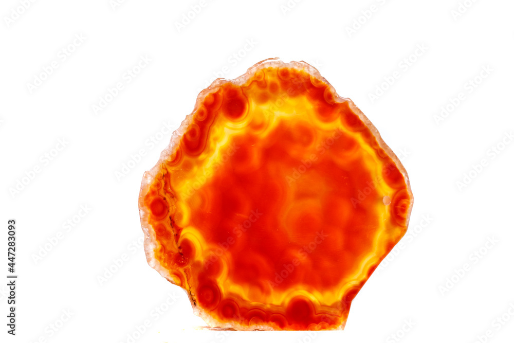 Macro mineral orange agate in crystals on white background Macro mineral orange agate in crystals on white background