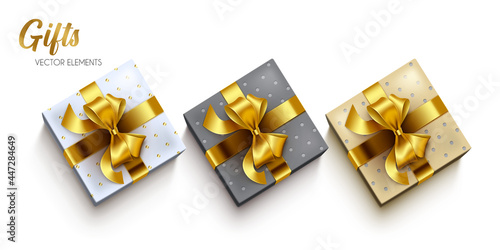 Gift boxes elements vector set. Gifts box with gold elegant ribbon lasso element for birthday, christmas, anniversary and thanks giving celebration gifts design. Vector illustration
