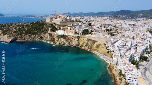 Fototapeta Naklejka Na Ścianę i Meble -  Aerial view of Dalt Vila, the walled city of Eivissa on Ibiza island, Spain - Santa María Cathedral overlooking the Mediterranean Sea in the capital of Ibiza