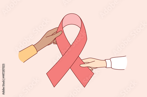 National Breast Cancer Awareness concept. Human Hands holding red ribbon as symbol of Breast Cancer Awareness vector illustration