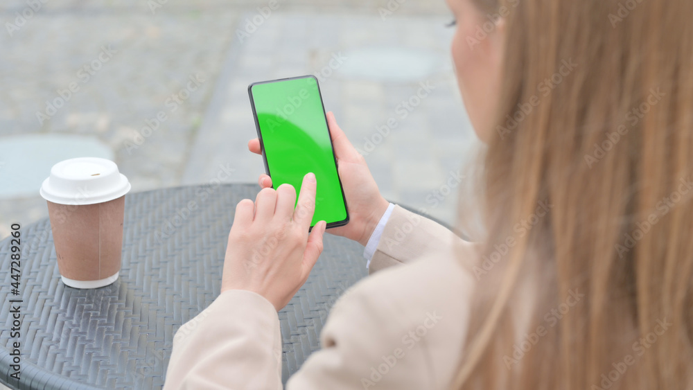 Businesswoman using Smartphone with Green Chroma Screen Outdoor Businesswoman using Smartphone with Green Chroma Screen Outdoor