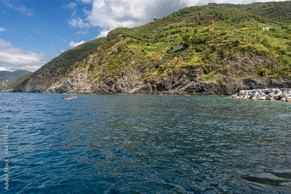 Coast  between the small villages of Vernazza and Monterosso al Mare, seen from the Sea, Cinque Terre national park, La Spezia province, UNESCO world heritage site, Liguria, Italy, Europe.