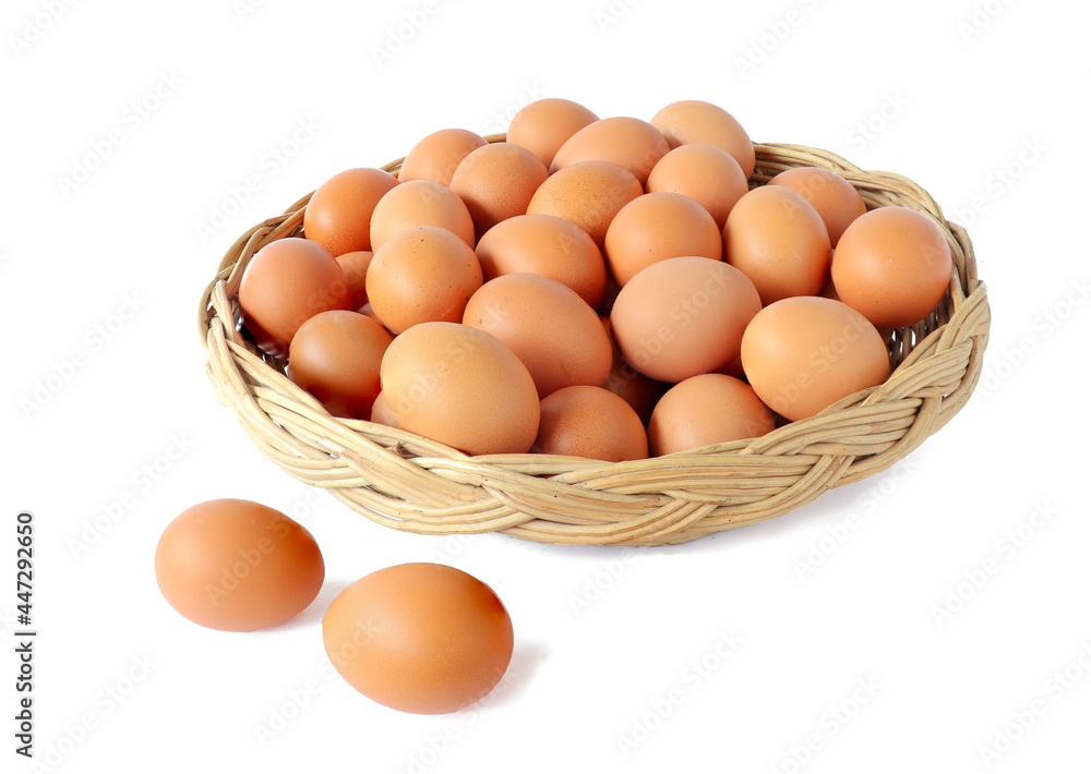 Fresh eggs in the basket isolated on white background Fresh eggs in the basket isolated on white background