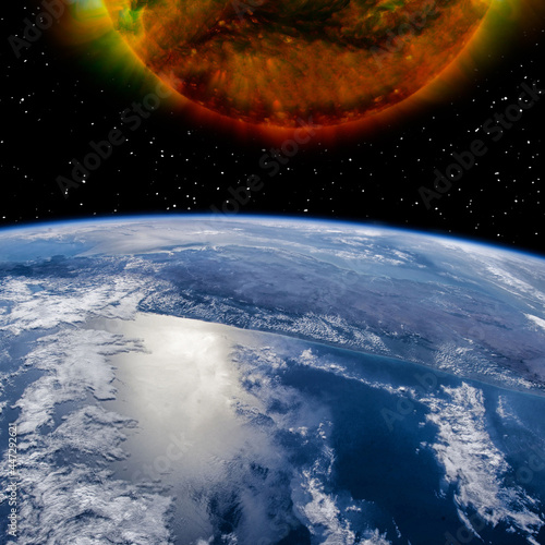 Fototapeta Naklejka Na Ścianę i Meble -  Earth and sun. The elements of this image furnished by NASA.