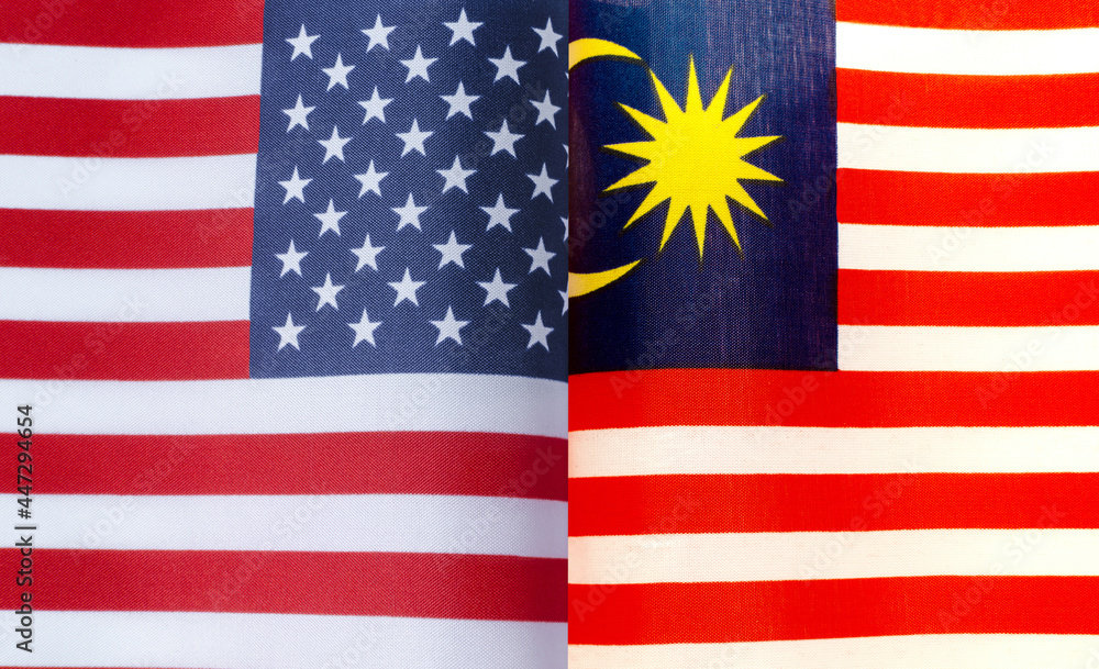Fototapeta premium fragments of the national flags of the United States and Malaysia in close-up