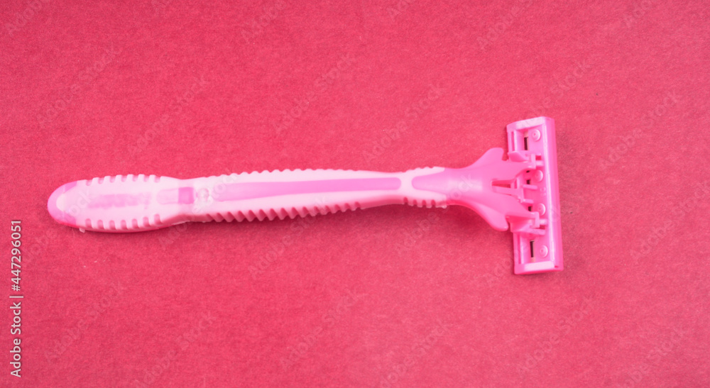 New pink disposable razors for safe shaving of female skin.Razor for smooth shaving. Sharp razors for personal hygienic routine. selective focus. New pink disposable razors for safe shaving of female skin.Razor for smooth shaving. Sharp razors for personal hygienic routine. selective focus.