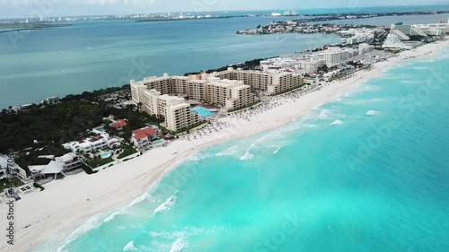 DLOG Flat Aerial drone view of cityscape of Cancun, famous resort city by Caribbean Sea - landscape panorama of Yucatan Peninsula from above, Mexico, Central America, 4k