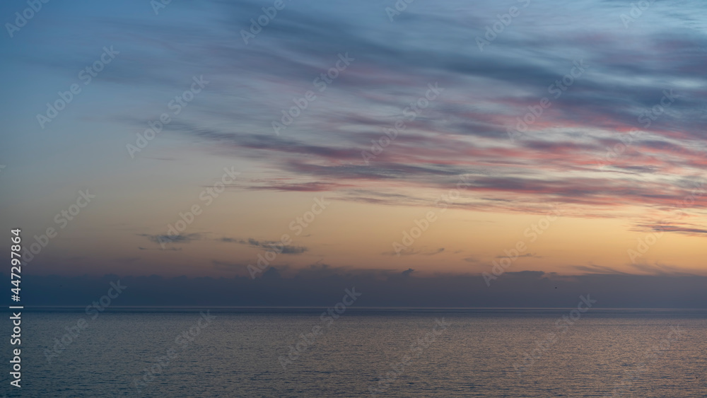 seascape with a beautiful sunset on the background of the sea seascape with a beautiful sunset on the background of the sea