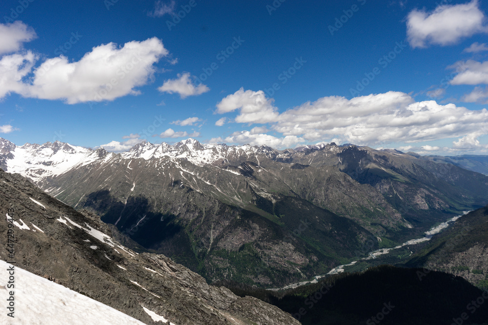 Great nature mountain landscapes. Fantastic perspective of caucasian snow inactive volcano Elbrus and clearly blue sky background. Russia