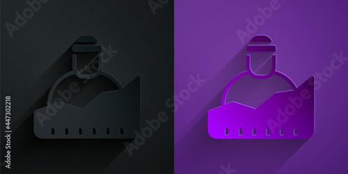Paper cut Growth of homeless icon isolated on black on purple background. Homelessness problem. Paper art style. Vector