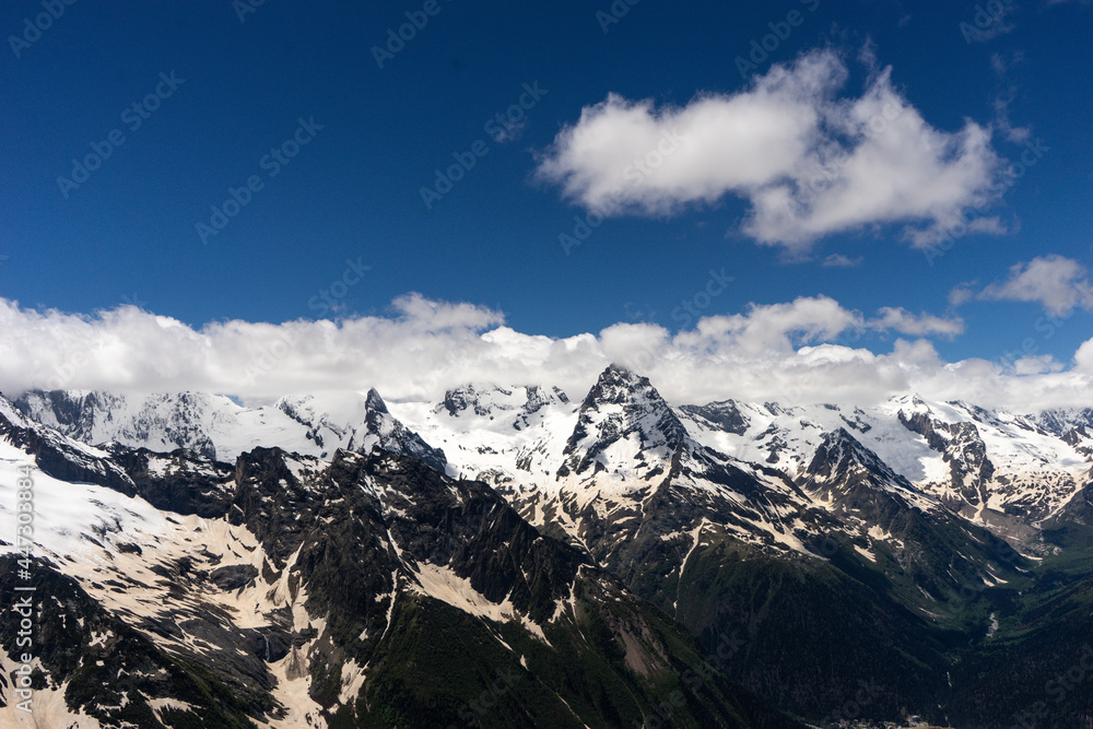 Obraz premium Great nature mountain landscapes. Fantastic perspective of caucasian snow inactive volcano Elbrus and clearly blue sky background. Russia
