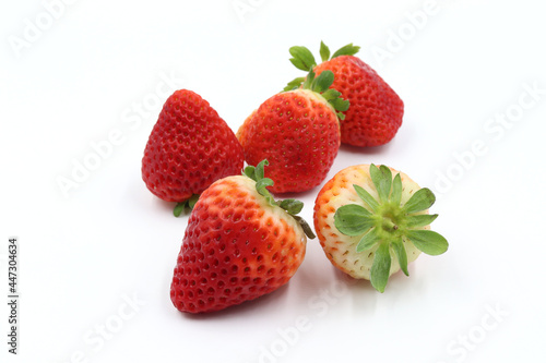 pile of fresh strawberry on white background