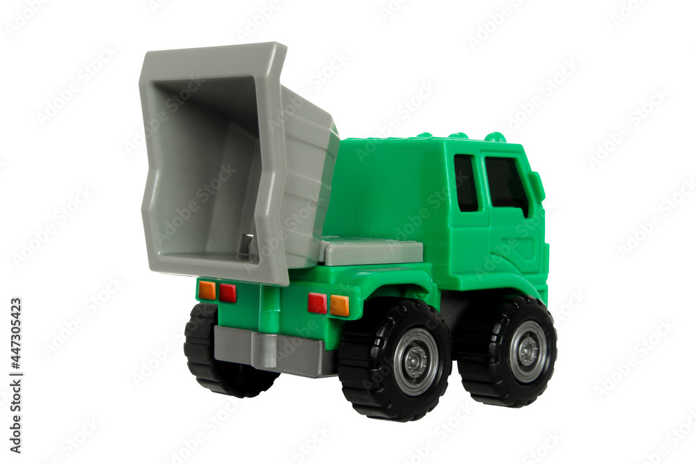 Toy dump truck for kids to play and enhance their learning Green truck with gray tray isolated on a withe background with clipping path