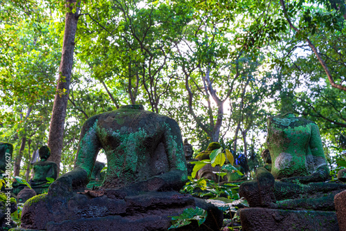 Ancient Wreckage Buddha Statue at U Mong Temple in Chiang Mai, Thailand.