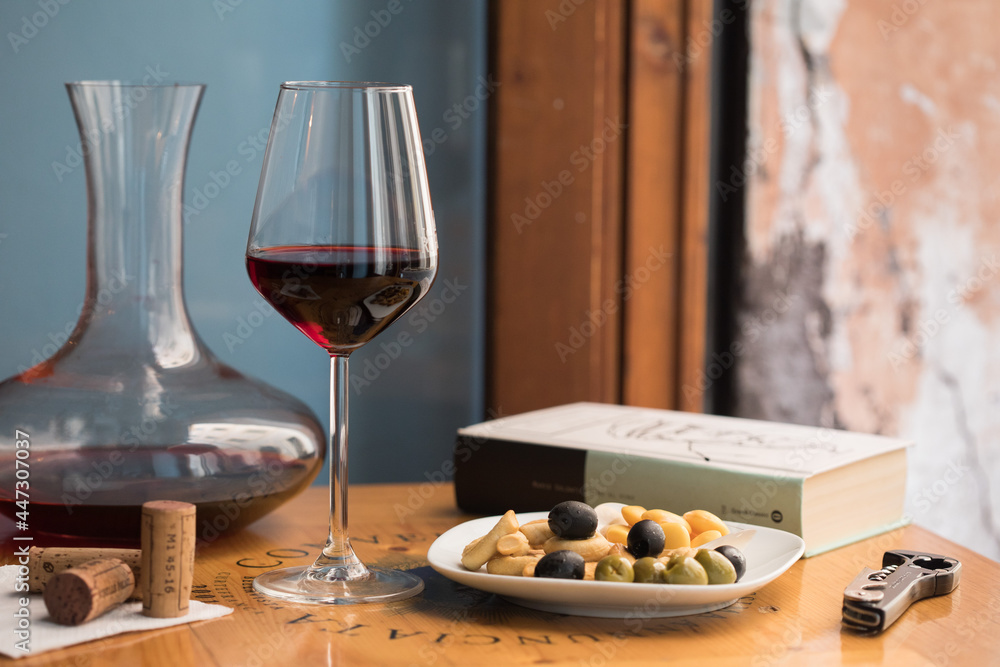 closeup of wine and a plate of grapefruits