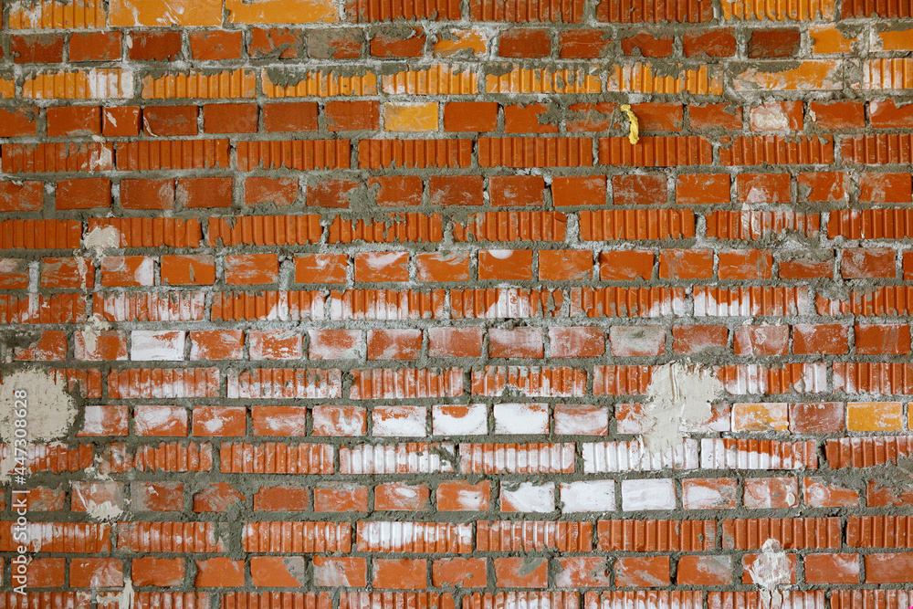 Red brick wall, abstract background texture.