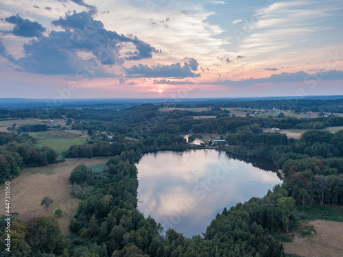 sunset over pond aerial view Vosges region France