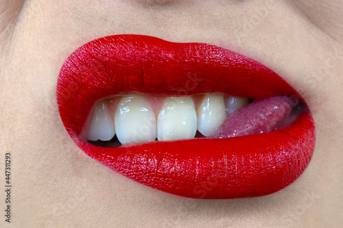 Fototapeta Sensual. sexy lips with red lipstick and white teeth