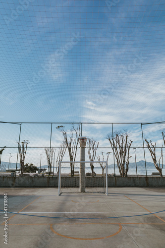 Basketball court on a sunny day.