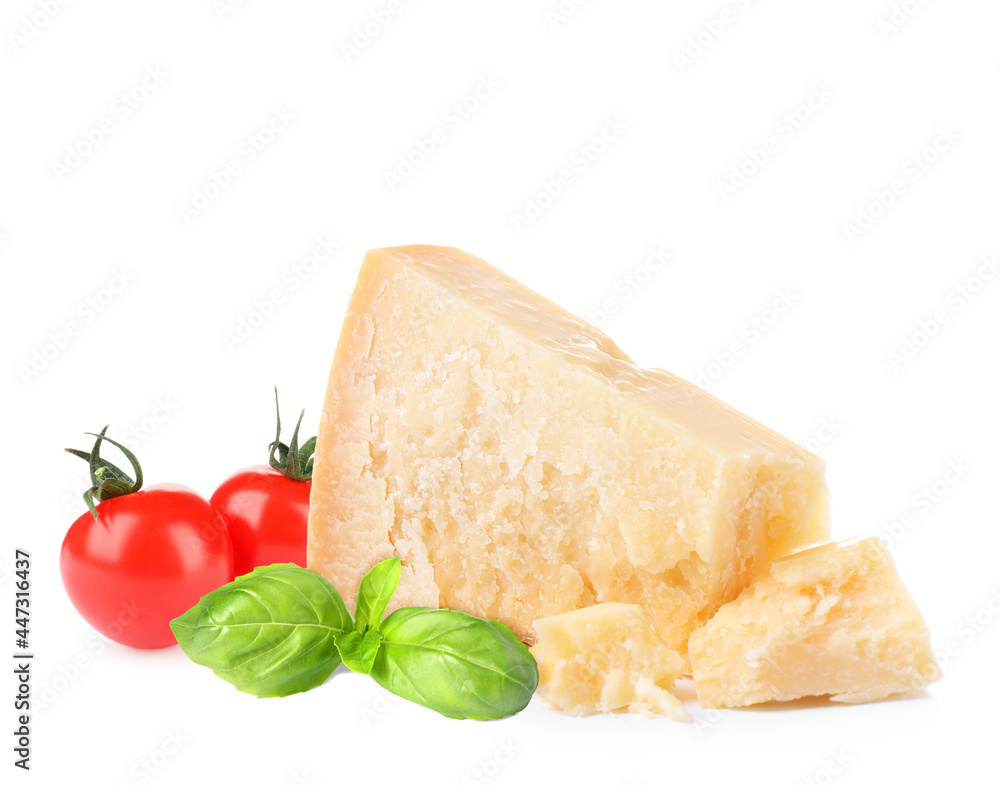 Delicious parmesan cheese, cherry tomatoes and basil on white background
