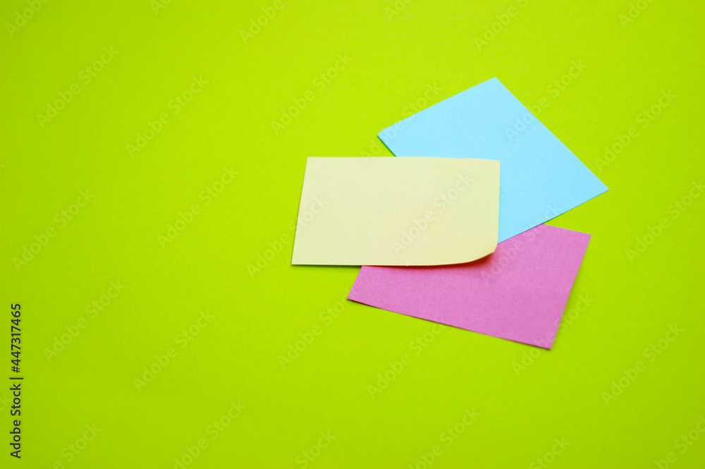 Blank colorful stickers on a light green background. Blank colorful stickers on a light green background.