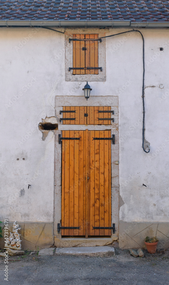 old wooden door shutters in french village