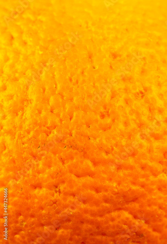 Close up photo of orange peel texture. Oranges ripe fruit background, macro view. .Human skin problem concept, acne and cellulite.