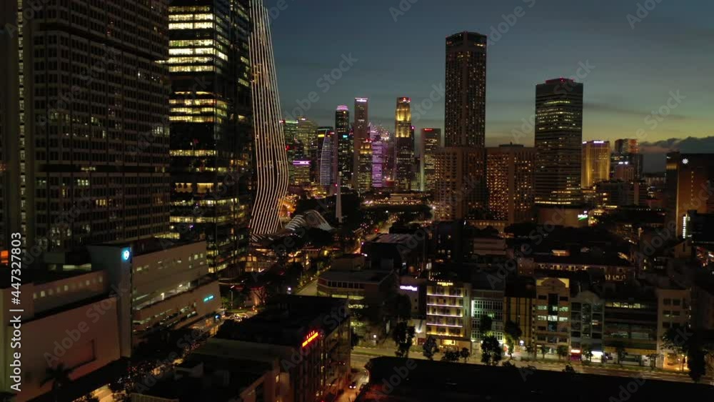 sunset sky night time illumination singapore city downtown traffic