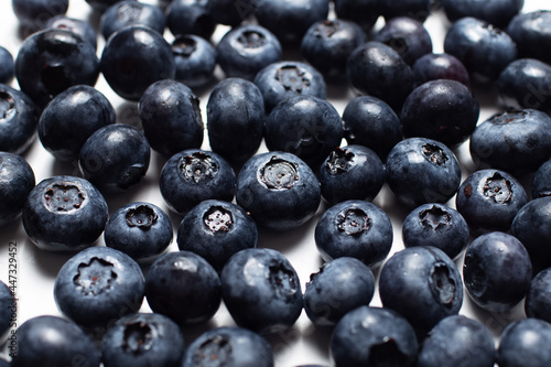Close-up photo of fresh blueberries, pattern concept.