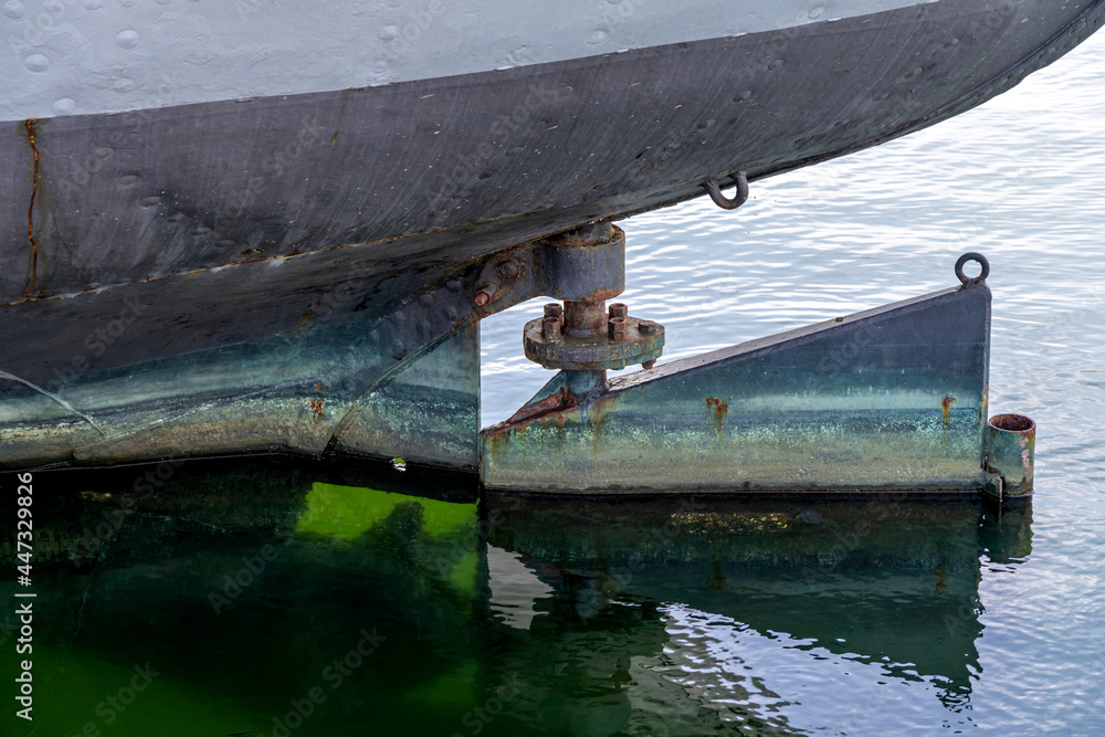 rudder of an old freight ship with reveted hull Stock Photo | Adobe Stock