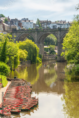 View of Knaresborough viaduct and the River Nidd with town houses in the background, Knaresborough, North Yorkshire, England photo