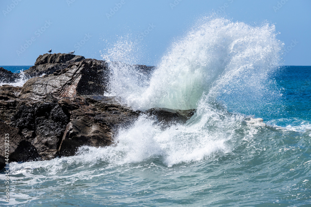 Heavy Atlantic seas with large waves crashing onto rocks on the beach at Ajuy on the Canary Island of Fuerteventura